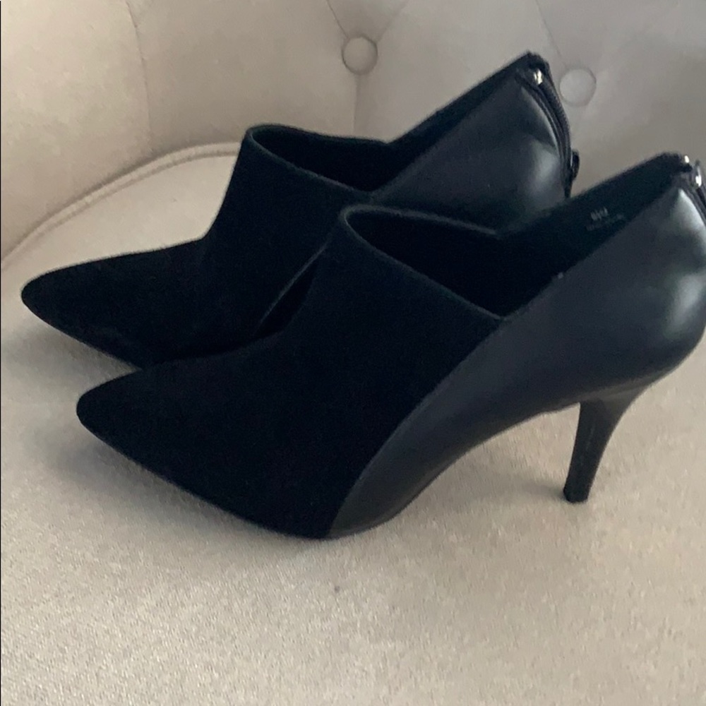 Pair of  black 8.5 dress ankle boots.
